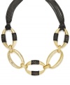 Urban chic. Chunky oval links and a multitude of thin chains adorn Alfani's bold statement necklace. Crafted in gold and hematite tone mixed metal. Approximate length: 18 inches + 3-inch extender.