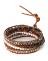 Take your wrist in a bohemian direction with Chan Luu's textured wrap bracelet. Contrasting tawny brown leather with inset crystal stones, this eclectic piece is perfect for layering.