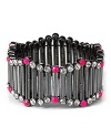 Give your an electric hit with Aqua's hematite-plated stretch bracelet. With stretch bars and fluorescent studs, this cuff is a tows the line between bold and blinding.