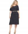 Polka dots are a playful finish to this sleek plus size dress from Jones New York. A skinny belt lends the perfect amount of definition at the waist.