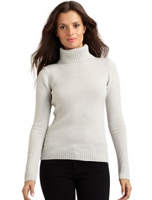 THE LOOKRibbed turtleneckLong sleevesRibbed cuffs and hemPullover styleTHE FITAbout 23 from shoulder to hemTHE MATERIALCashmereCARE & ORIGINDry cleanImportedModel shown is 5'11 (180cm) wearing US size Small. 
