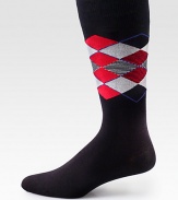 Bold, colorful argyle patterns with striped detail accents this dapper dress sock, crafted from a comfortable stretch cotton blend for long-lasting style and support.Mid-calf heightCotton/polyamide/modal/elastane Machine washImported