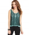 A dark, open-knit overlay makes this top from Material Girl a cool pick for summertime style!