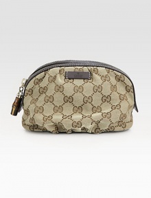 Timeless GG jacquard crafted in a top-zip bag with leather trim.Top zip closureOne inside open pocketFully lined7½W X 5½H X 3DMade in Italy Timeless GG jacquard crafted in a top-zip bag with leather trim.Top zip closureOne inside open pocketFully lined7½W X 5½H X 3DMade in Italy