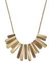 Branch out with Alfani's eye-catching bib necklace. Brown resin and gold tone stick drops are displayed on a gold tone mixed metal chain. Approximate length: 19 inches + 2-inch extender. Approximate drop: 4-1/2 to 5 inches.