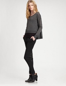 Ultra-soft with a hint of stretch, this hi-lo design with ribbed trim has instant appeal. ScoopneckLong sleevesDropped shouldersPull-on styleRibbed trimSide slitsAbout 18 from shoulder to hem83% viscose/17% nylonHand washImported of Italian fabric Model shown is 5'10 (177cm) wearing US size Small. 