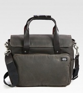 Waxwear brief, roomy enough to tote around all of your essentials, will burnish and patina with age.Flap, zip closureDouble top handlesRemovable shoulder strapExterior, interior zip pocketsWaxed cotton/leather12W x 15H x 6DImported