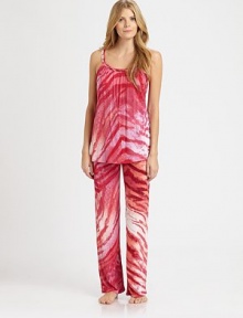 Smooth, loose-fitting design with a bold exotic print and beautiful front shirring. ScoopneckSleevelessFront shirringDrawstring waistbandInseam, about 26RayonMachine washImported Smooth, loose-fitting design with a bold exotic print and beautiful front shirring. ScoopneckSleevelessFront shirringDrawstring waistbandInseam, about 26RayonMachine washImported