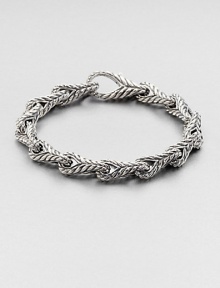 With impeccable sculpting and attention to detail, this 8-link bracelet of sterling silver makes the ultimate statement in signature style.Sterling silverLobster claspAbout 9 diam.Made in USA With impeccable sculpting and attention to detail, this 8-link bracelet of sterling silver makes the ultimate statement in signature style.Sterling silverLobster claspAbout 9 diam.Made in USA