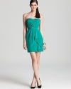 Featuring flattering ruching and draping, this pop-bright Shohanna strapless dress infuses your party portfolio with sensational color.