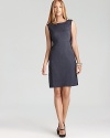 A mastery in figure flattery, this T Tahari sheath dress flaunts a chic contrast back and slimming waist accents for an effortless hourglass silhouette.