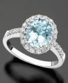 The alluring hue of oval-cut aquamarine (2-1/4 ct. t.w.) is complimented by the sparkling brilliance of round-cut diamond (1/2 ct. t.w.) on this beautiful 14k white gold ring.