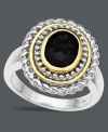 Intricate bliss. A swirling, beaded setting in sterling silver and 14k gold highlights the bold oval onyx (1-5/8 mm) that sits at the center of this standout ring. Size 7.