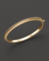 The classic bangle in 18 Kt. gold. Designed by Roberto Coin.