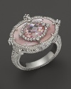 A pink mother-of-pearl and crystal sterling silver ring with white sapphire accents. By Judith Ripka.