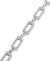 Glittering and geometric. An elegant rectangular silhouette stands out on Lauren by Ralph Lauren's stylish link bracelet. Embellished with sparkling crystals, it's set in silver tone mixed metal. Approximate length: 8 inches.