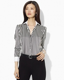 Inspired by haberdashery menswear styles, a chic silk blouse is finished with a crisp club collar.