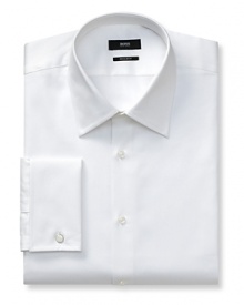 Slightly trimmer than classic fit, button front long-sleeved shirt. Voluminous Kent collar. French cuffs. Flat back yoke with no pleats. Clean front, no pocket. Rounded hem. Textured solid. Slightly trimmer than classic fit, button front long-sleeved shirt. Voluminous Kent collar. French cuffs. Flat back yoke with no pleats. Clean front, no pocket. Rounded hem. Textured solid.