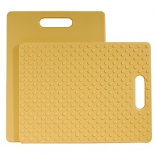 This cutting board will come in handy when it's time to chop vegetables, mince herbs or slice meats. Made of high-density plastic, this cutting board won't absorb odors like wood. The bottom surface is covered in raised rubber grippers that help the board remain stationary as you work. This cutting board will come in handy when it's time to chop vegetables, mince herbs or slice meats. Made of high-density plastic, this cutting board won't absorb odors like wood. The bottom surface is covered in raised rubber grippers that help the board remain stationary as you work.