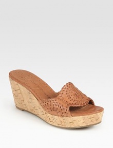 Earthy cork wedge and platform graced by a supple leather upper with embroidery-like stitching. Cork wedge, 2½ (65mm)Cork platform, 1 (25mm)Compares to a 1½ heel (40mm)Leather upperLeather liningRubber solePadded insoleImportedOUR FIT MODEL RECOMMENDS ordering true size. 