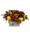 Top your table with a lively centerpiece. The Mixed Fruit planter features a myriad of fruits clustered with pine branches, showcasing one festive harvest.