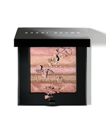 This shimmering, brush-on powder creates a soft, warm pink glow. Works well with neutral and pink blush shades. This shimmering, brush-on powder creates a soft, warm pink glow. Works well with neutral and pink blush shades.