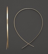 An inverted hoop earring in 14 Kt. gold, with thread-through closure. Designed by Lana.