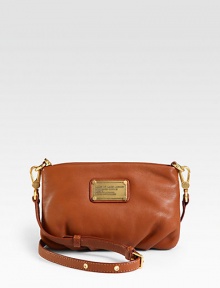 Softly pebbled leather crafted in a slouchy baguette silhouette, finished with an adjustable crossbody strap.Adjustable detachable crossbody strap, 22-26½ dropTop zip closureOne inside open pocketLogo-printed lining10W X 6½H X ¾D ImportedPlease note: Hardware color varies by bag. Softly pebbled leather crafted in a slouchy baguette silhouette, finished with an adjustable crossbody strap.Adjustable detachable crossbody strap, 22-26½ dropTop zip closureOne inside open pocketLogo-printed lining10W X 6½H X ¾D ImportedPlease note: Hardware color varies by bag.
