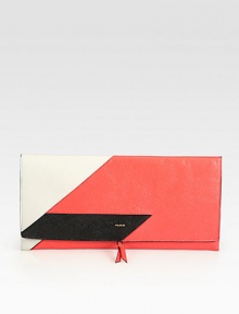 A graphic colorblock design in supple leather.Magnetic snap flap closureOne removable phone caseLeather lining13½W X 7H X ½DMade in Italy A graphic colorblock design in supple leather.Magnetic snap flap closureOne removable phone caseLeather lining13½W X 7H X ½DMade in Italy