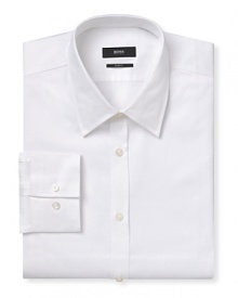 Slim fit shirt with spread collar. Barrel cuffs with two buttons to resize width. Clean front, no pocket. Back yoke with two darts. Rounded him with triangular gusset inserts. Solid shirt with herringbone textured pattern. Slim fit shirt with spread collar. Barrel cuffs with two buttons to resize width. Clean front, no pocket. Back yoke with two darts. Rounded him with triangular gusset inserts. Solid shirt with herringbone textured pattern.