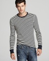 A laid-back tee with a traditional stripe design matches your easy-going attitude. Wear with jeans for a classic tandem.