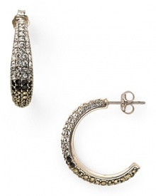 Judith Jack styles sweet simplicity with this pair of graduated hoop earrings, set in sterling silver and accented by mesmerizing tonal crystals.