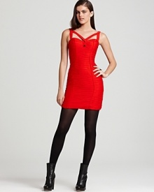 Fierce and fiery, this red Rebecca Minkoff dress features a unique crisscross neckline and fabulous pleats for statement status at your next special event. Create an edgy contrast with tough-luxe booties and a sleek leather jacket.