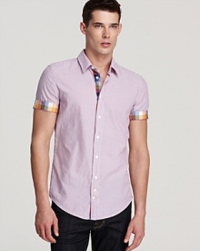 Bright checks peek out from the interior placket and are lurking underneath the sleeve edge, too, adding a touch of fine design to this jaunty short-sleeve button-down shirt from BOSS Orange. Bright checks peek out from the interior placket and are lurking underneath the sleeve edge, too, adding a touch of fine design to this jaunty short-sleeve button-down shirt from BOSS Orange.