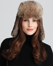 A gorgeous rabbit fur aviator hat ensures a stylish and cozy cold weather season.