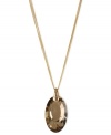 Become the center of attention with this pendant necklace from Kenneth Cole New York. Crafted from gold-tone mixed metal, the chains hold a stunning topaz-colored oval pendant with glistening accents. Item comes packaged in a signature Kenneth Cole New York Gift Box. Approximate length: 16 inches + 3-inch extender. Approximate drop: 1-3/4 inches.