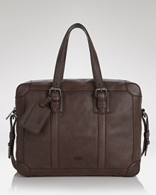 An uncommonly smart everyday bag, this BOSS Black briefcase is crafted from fine supple leather, outfitted with excellent organizational pockets and designed for handsome, masculine appeal. An uncommonly smart everyday bag, this BOSS Black briefcase is crafted from fine supple leather, outfitted with excellent organizational pockets and designed for handsome, masculine appeal.