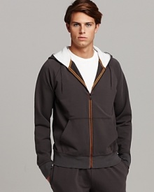 Full front zip hooded sweatshirt with split kangaroo pocket. Thermal, contrast lined hoodie. Orange trim detail at zipper. Full front zip hooded sweatshirt with split kangaroo pocket. Thermal, contrast lined hoodie. Orange trim detail at zipper.
