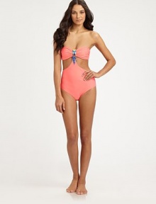 An exotic swim style that shows just the right amount of skin, thanks to sexy cutout details. Bandeau topCutout detailsBeaded centerBack clasp closureFully lined80% nylon/20% spandexHand washImported An exotic swim style that shows just the right amount of skin, thanks to sexy cutout details. Bandeau topCutout detailsBeaded centerBack clasp closureFully lined80% nylon/20% spandexHand washImported