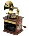 A beautiful replica of an antique gramophone, this piece from Mr. Christmas features interchangeable disks that play 12 Christmas classics performed by renowned artists such as Bing Crosby, the Andrews Sisters and Eartha Kitt. Battery operated.