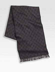 Fine wool scarf with signature GG grid. Fringed ends 14W X 70H Wool Dry clean Made in Italy Fine wool scarf with signature GG grid. Fringed ends 14W X 70H Wool Dry clean Made in Italy