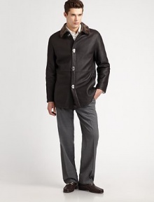 Luxurious Italian calfskin is treated to shearling lining, making it extra-warm and stylish. Gancini clasp closures Side pockets About 32¼ from shoulder to hem Dry clean by leather/fur specialist Made in Italy Fur origin: Spain Luxurious Italian calfskin is treated to shearling lining, making it extra-warm and stylish. Gancini clasp closures Side pockets About 32¼ from shoulder to hem Dry clean by leather/fur specialist Made in Italy Fur origin: Spain