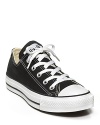 Converse low-top canvas sneakers have old-school charm. Comfortable classic lace-up style and rubber-covered toe.