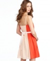 Score picture perfect style in this two-tone chiffon dress, made all the more cute with a ribbon belt! By American Rag.