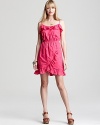 Look buoyantly toward the season in a posy-fresh Lilly Pulitzer dress blooming with a subtle nautical print.