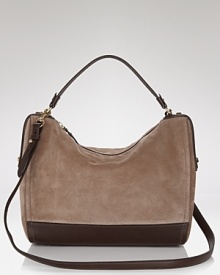 Tap this season's textured craze with this mixed media bag from Salvatore Ferragamo. Crafted of suede and trimmed in leather, it's a chic way to carry a major trend. Tap this season's textured craze with this mixed media bag from Salvatore Ferragamo. Crafted of suede and trimmed in leather, it's a chic way to carry a major trend.