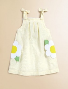 Fashioned in crisp seersucker, this cheery A-line frock is abloom in colorful stripes and tulips.SquareneckSleeveless with shoulder tiesBack zipperFlower pockets65% cotton/35% polyesterMachine washImported Fashioned in crisp seersucker, this cheery A-line frock is abloom in colorful stripes and tulips.SquareneckSleeveless with shoulder tiesBack zipperFlower pockets65% cotton/35% polyesterMachine washImported