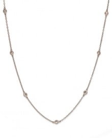 Inch by inch of luminous sparkle. B. Brilliant's delicate necklace features nine round-cut cubic zirconia stations (9/10 ct. t.w.) set in 18k gold over sterling silver. Approximate length: 20 inches. Inch by inch of luminous sparkle. B. Brilliant's delicate necklace features nine round-cut cubic zirconia stations (9/10 ct. t.w.) set in 18k gold over sterling silver. Approximate length: 20 inches.