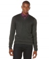 This classy Perry Ellis sweater looks great over a button down shirt with tie or a tee for a more casual look.