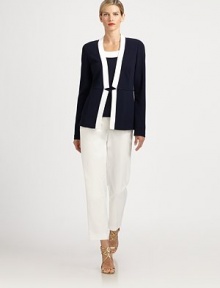 Bold contrast trim and notched details define this knit design.Open frontContrast trimWaist notchesAbout 26 from shoulder to hemWool/rayonDry cleanMade in USAModel shown is 5'10 (177cm) wearing US size 4. Bold contrast trim and notched details define this knit design.Open frontContrast trimWaist notchesAbout 26 from shoulder to hemWool/rayonDry cleanMade in USAModel shown is 5'10 (177cm) wearing US size 4.